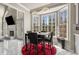 Dining area with an exquisite light fixture and a beautiful outdoor view at 1290 Regency Center Sw Dr, Atlanta, GA 30331