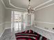 Bright dining room with marble floors and an open floorplan concept for easy entertaining at 1290 Regency Center Sw Dr, Atlanta, GA 30331