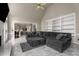 Open living room showcasing fireplace, built-in shelving, and entrance to the kitchen at 1290 Regency Center Sw Dr, Atlanta, GA 30331