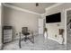 Office space with a view of the staircase and a dark screen in the wall at 1290 Regency Center Sw Dr, Atlanta, GA 30331