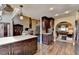 Spacious kitchen seamlessly connects to the living and dining areas in an open-concept design at 5180 Cameron Forest Pkwy, Johns Creek, GA 30022