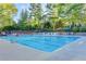 Sparkling community pool with ample lounge chairs, ideal for enjoying sunny days at 5180 Cameron Forest Pkwy, Johns Creek, GA 30022