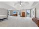 Expansive main bedroom with a sitting area and bright windows at 6328 Woodlore Nw Dr, Acworth, GA 30101