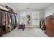 Spacious walk-in closet with organized storage and natural light at 6328 Woodlore Nw Dr, Acworth, GA 30101