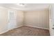 Cozy bedroom with carpet flooring, neutral walls, and a bright atmosphere at 2867 Mitchell Dr, Decatur, GA 30032