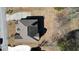 An aerial view of a home with a large roof and well-maintained surrounding property at 6026 Southland Dr, Stone Mountain, GA 30087