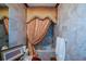 Bathroom featuring a luxurious shower and elegant bathtub, with marble walls adding a touch of sophistication at 6026 Southland Dr, Stone Mountain, GA 30087
