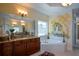The primary bathroom includes a mural, garden tub, and granite countertop at 6026 Southland Dr, Stone Mountain, GA 30087