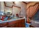 Luxurious bathroom with stylish vanity and elegant decorative details creating a spa-like experience at 6026 Southland Dr, Stone Mountain, GA 30087