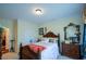 Inviting bedroom with an accent wall and natural light, providing a welcoming atmosphere for relaxation at 6026 Southland Dr, Stone Mountain, GA 30087