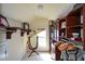 A walk-in closet with built-in shelving, clothing racks, mirror, and natural light at 6026 Southland Dr, Stone Mountain, GA 30087