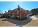Beautiful brick home with a well-manicured lawn and mature landscaping, offering great curb appeal at 6026 Southland Dr, Stone Mountain, GA 30087