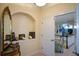 A hallway alcove with a gold mirror adds to the upscale design of the home at 6026 Southland Dr, Stone Mountain, GA 30087