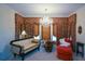 A cozy living room with a chandelier and unique curtains adds an elegant flair at 6026 Southland Dr, Stone Mountain, GA 30087