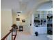 A loft area with built-in shelving provides a quiet space overlooking the lower level of the home at 6026 Southland Dr, Stone Mountain, GA 30087