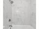 Bathroom features marble look tile in the shower and tub combination at 2005 Simmons Ave, Atlanta, GA 30337