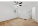This bedroom offers wood floors, closet, and a window view at 2005 Simmons Ave, Atlanta, GA 30337