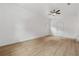 Bright, airy living room with a large window and light wood flooring at 2005 Simmons Ave, Atlanta, GA 30337