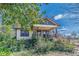 Charming bungalow featuring a cozy front porch and mature landscaping at 3630 Union Ave, Hapeville, GA 30354