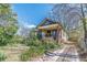 Bungalow featuring a cozy front porch and traditional architectural details at 3630 Union Ave, Hapeville, GA 30354