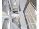 Grand foyer with staircase, arched doorways, and plenty of natural light at 5170 Black Bear Trl, Douglasville, GA 30135