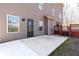 Back of home shows patio area with space for outdoor seating at 5170 Black Bear Trl, Douglasville, GA 30135