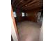 Bedroom space with wood paneling, natural light, and interior access at 3518 Hamlin Cir, Atlanta, GA 30341