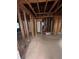 Large living room with natural light and exposed beams ready for renovation at 3518 Hamlin Cir, Atlanta, GA 30341