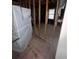 Unfinished room shows exposed framing, flooring and a window at 3518 Hamlin Cir, Atlanta, GA 30341