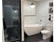 Elegant bathroom with a freestanding tub and modern black fixtures at 361 17Th Nw St # 2423, Atlanta, GA 30363