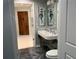 Stylish bathroom boasts a modern double vanity, and sleek fixtures at 361 17Th Nw St # 2423, Atlanta, GA 30363