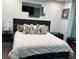 Modern bedroom featuring a plush bed, stylish decor, and ample natural light at 361 17Th Nw St # 2423, Atlanta, GA 30363