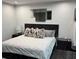 Comfortable bedroom with a large bed, plush pillows, and modern decor at 361 17Th Nw St # 2423, Atlanta, GA 30363