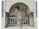 Modern building entrance featuring a unique arched design at 361 17Th Nw St # 2423, Atlanta, GA 30363
