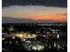 Captivating nighttime city view with illuminated buildings and a colorful twilight sky at 361 17Th Nw St # 2423, Atlanta, GA 30363