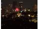Breathtaking nighttime city view highlighting illuminated skyscrapers and a vibrant Ferris wheel at 361 17Th Nw St # 2423, Atlanta, GA 30363