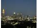 Impressive nighttime city view showcasing brightly lit buildings and a picturesque skyline at 361 17Th Nw St # 2423, Atlanta, GA 30363