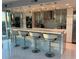 Contemporary kitchen features barstool seating, and stainless steel appliances at 361 17Th Nw St # 2423, Atlanta, GA 30363