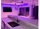 Contemporary kitchen with waterfall countertops, stainless steel appliances, and recessed lighting at 361 17Th Nw St # 2423, Atlanta, GA 30363