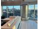 Bright living room with floor-to-ceiling windows overlooking the city skyline at 361 17Th Nw St # 2423, Atlanta, GA 30363