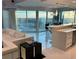 Open concept living area featuring a modern kitchen and gorgeous city views at 361 17Th Nw St # 2423, Atlanta, GA 30363