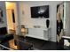 Modern living room design with sleek furniture and a wall-mounted television at 361 17Th Nw St # 2423, Atlanta, GA 30363