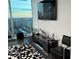 Living room featuring a sleek entertainment center and city views at 361 17Th Nw St # 2423, Atlanta, GA 30363