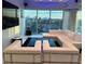 Stylish living room with comfortable seating and a stunning city view at 361 17Th Nw St # 2423, Atlanta, GA 30363