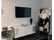 Contemporary living room with a mounted TV and modern decor at 361 17Th Nw St # 2423, Atlanta, GA 30363