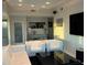 Modern living room with large TV, comfortable seating, and city views at 361 17Th Nw St # 2423, Atlanta, GA 30363
