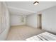 Finished basement with white walls, neutral floors and two shuttered windows at 355 Ridgeview Trl, Atlanta, GA 30328