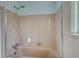 Vintage tiled bathroom features a shower/tub combination with a shower head at 355 Ridgeview Trl, Atlanta, GA 30328