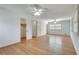 Bright bedroom with two ceiling fans, hardwood floors, and natural light from the large windows at 355 Ridgeview Trl, Atlanta, GA 30328