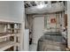 This laundry area features modern appliances and shelving, and ample storage space at 355 Ridgeview Trl, Atlanta, GA 30328